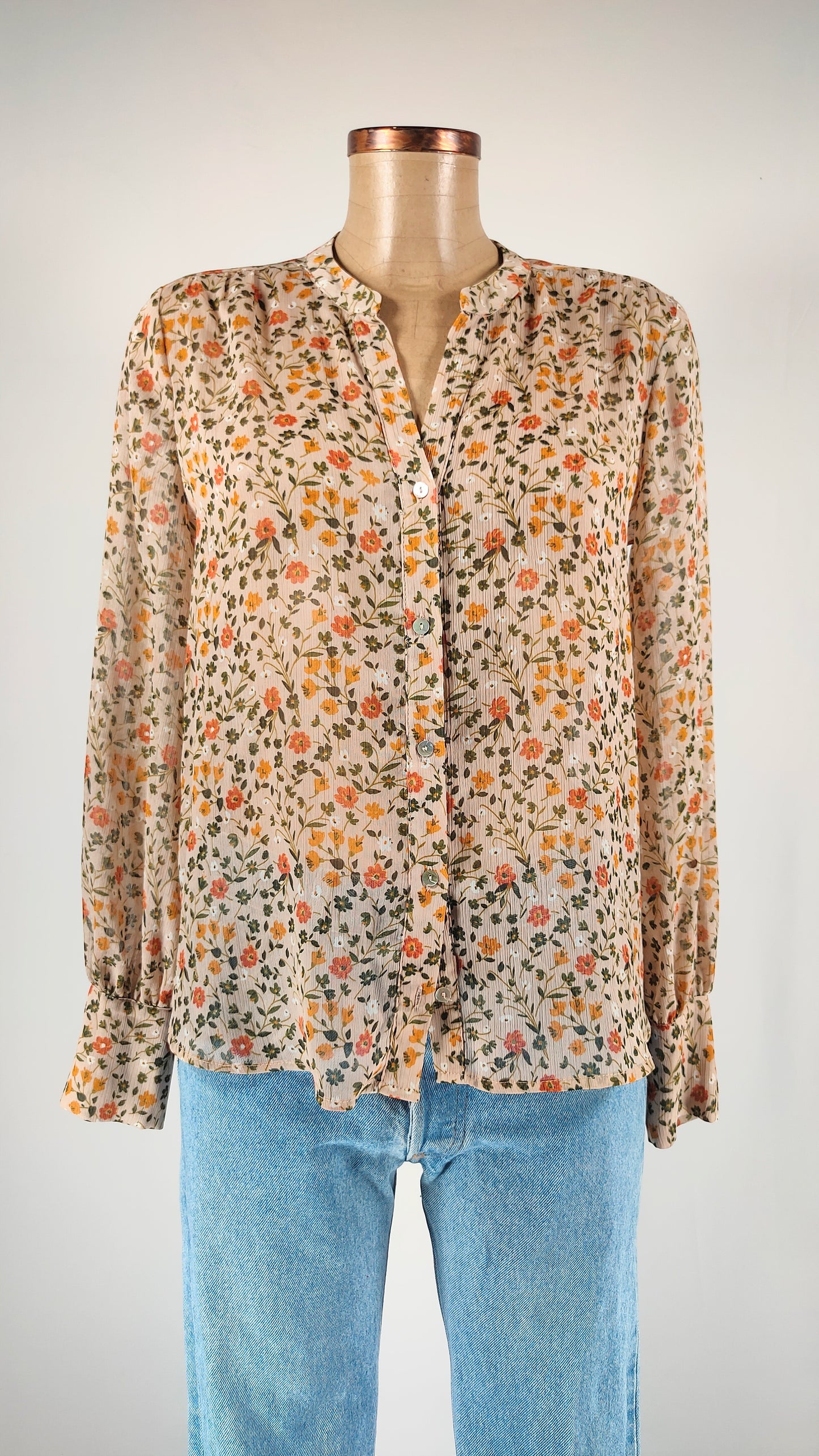 Blusa semi transparente de flores