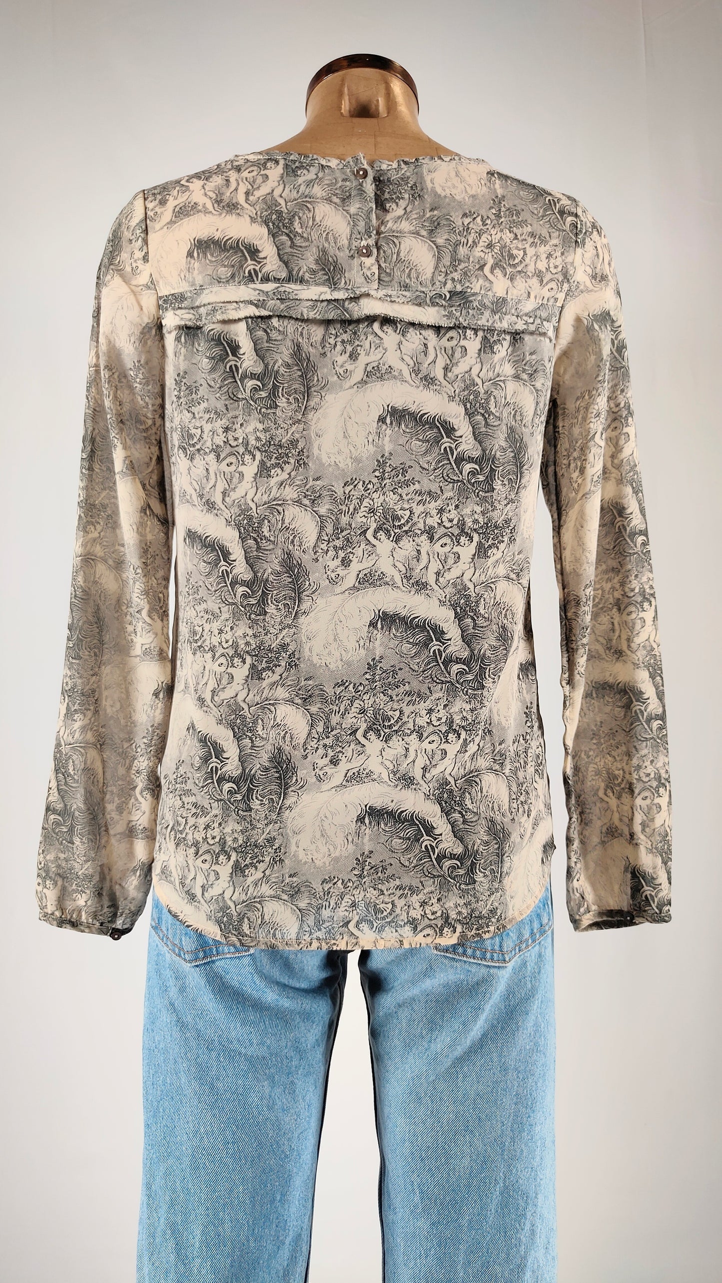 Blusa semitransparente con forro