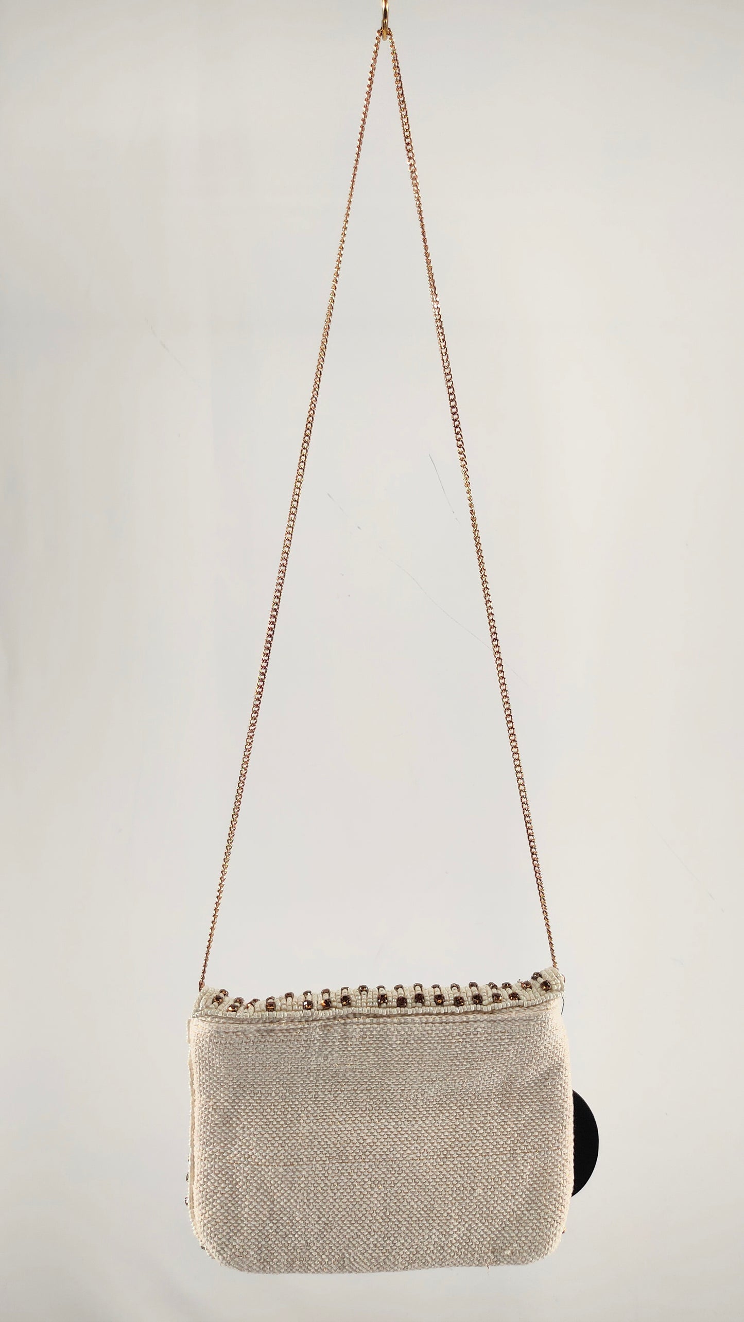 Bolso con apliques brillantes