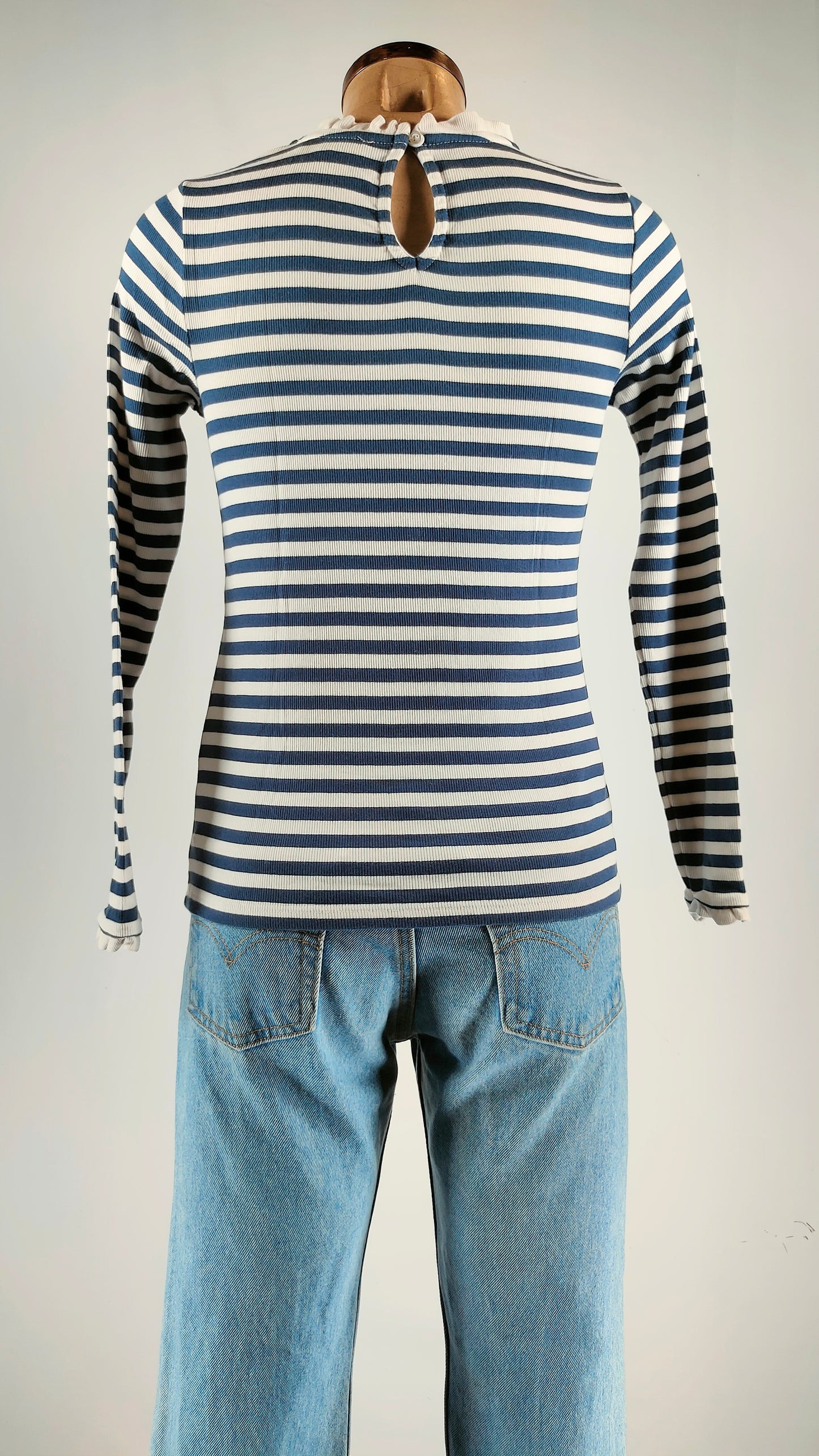 Camiseta de rayas con detalle de cuello y puños