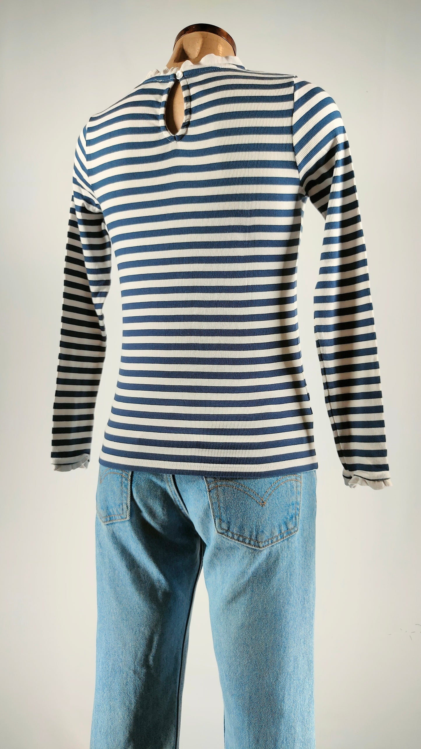 Camiseta de rayas con detalle de cuello y puños