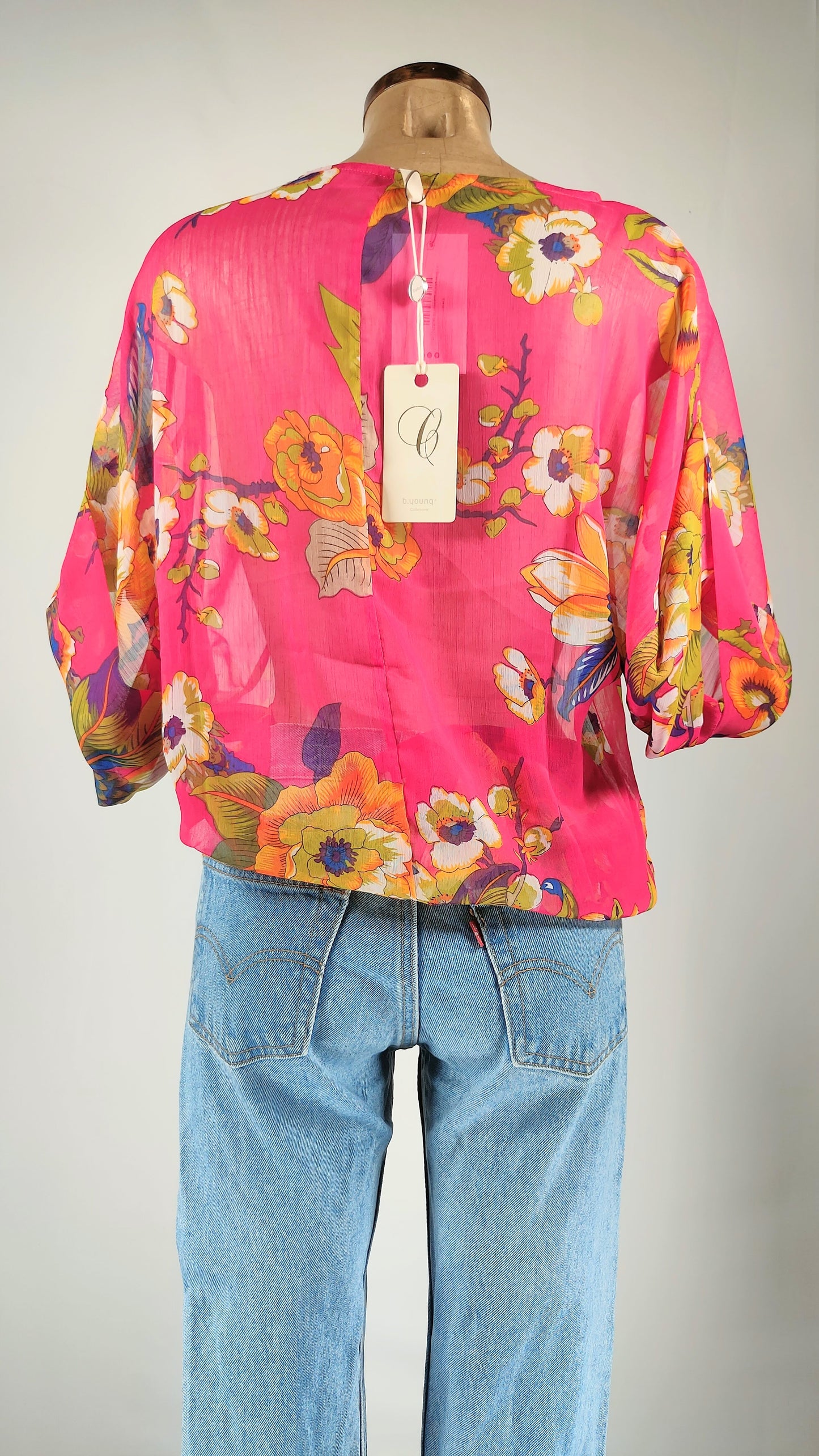 Blusa semitransparente