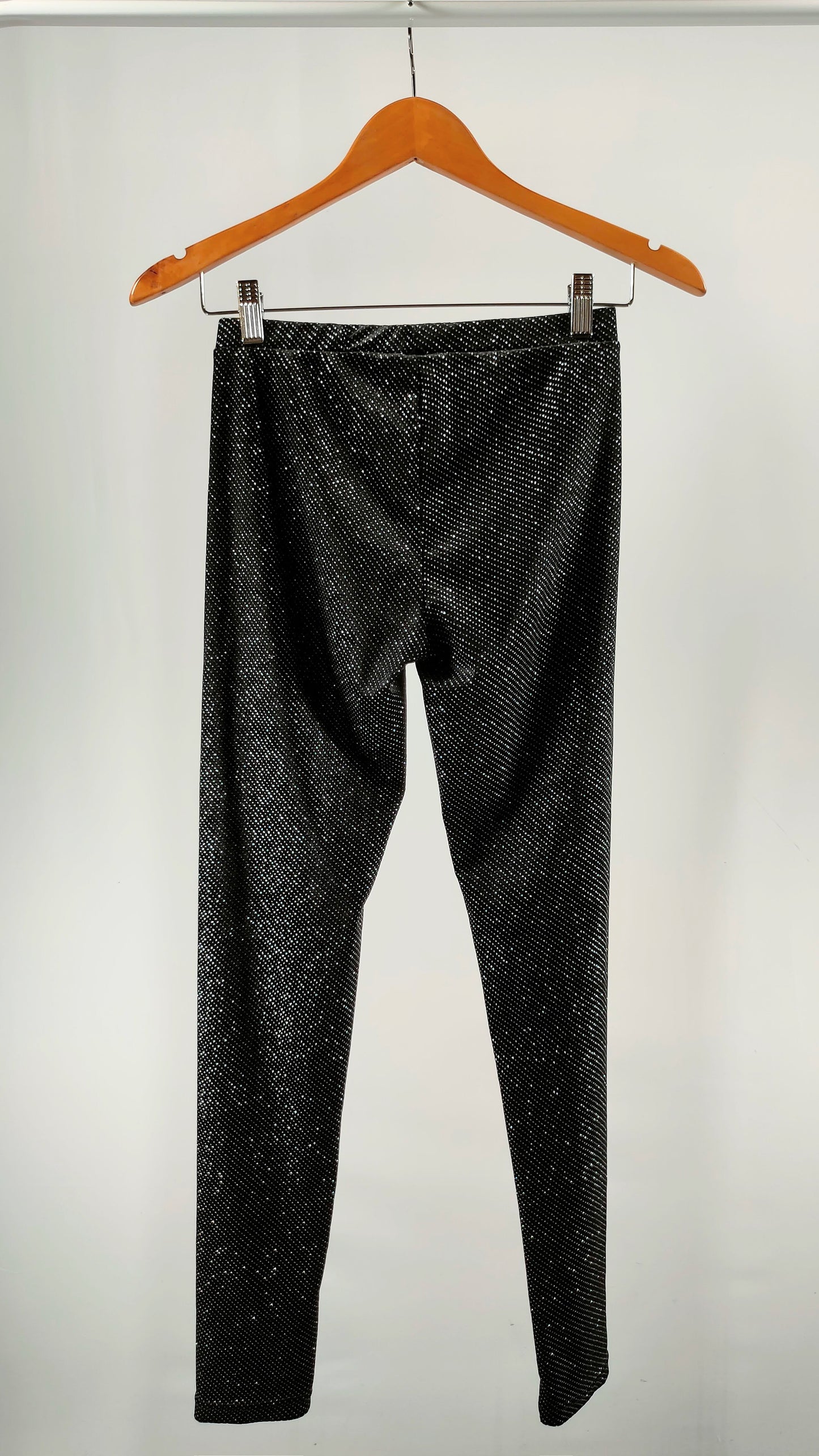 Pantalones ajustados con apliques brillantes