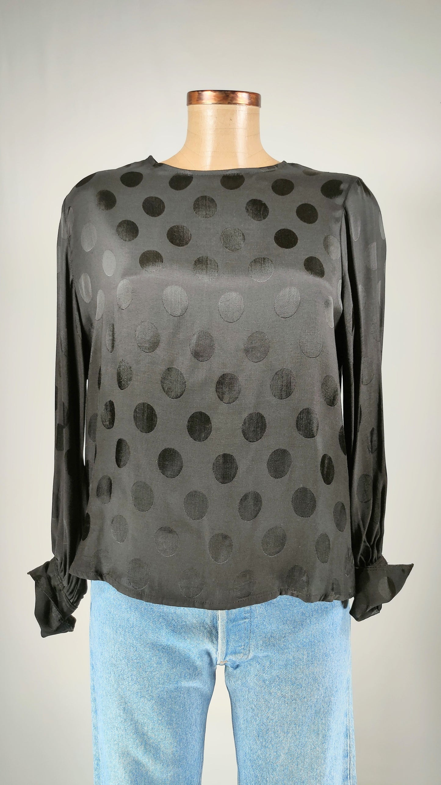 Blusa a topos