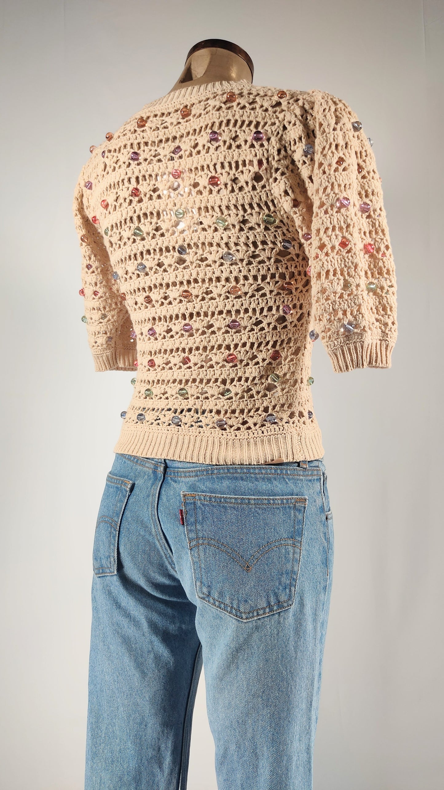 Jersey calado con bolitas multicolor