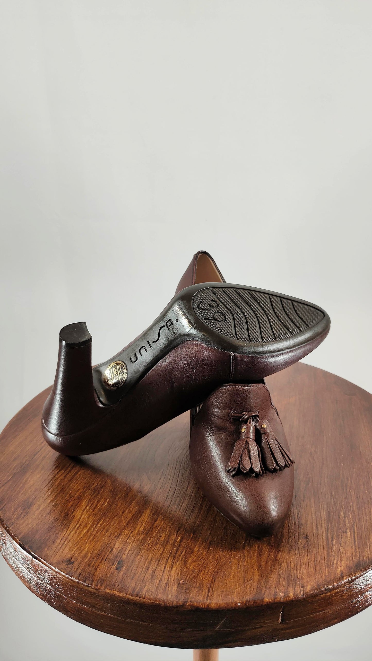 Zapatos de tacón alto y detalle de flecos