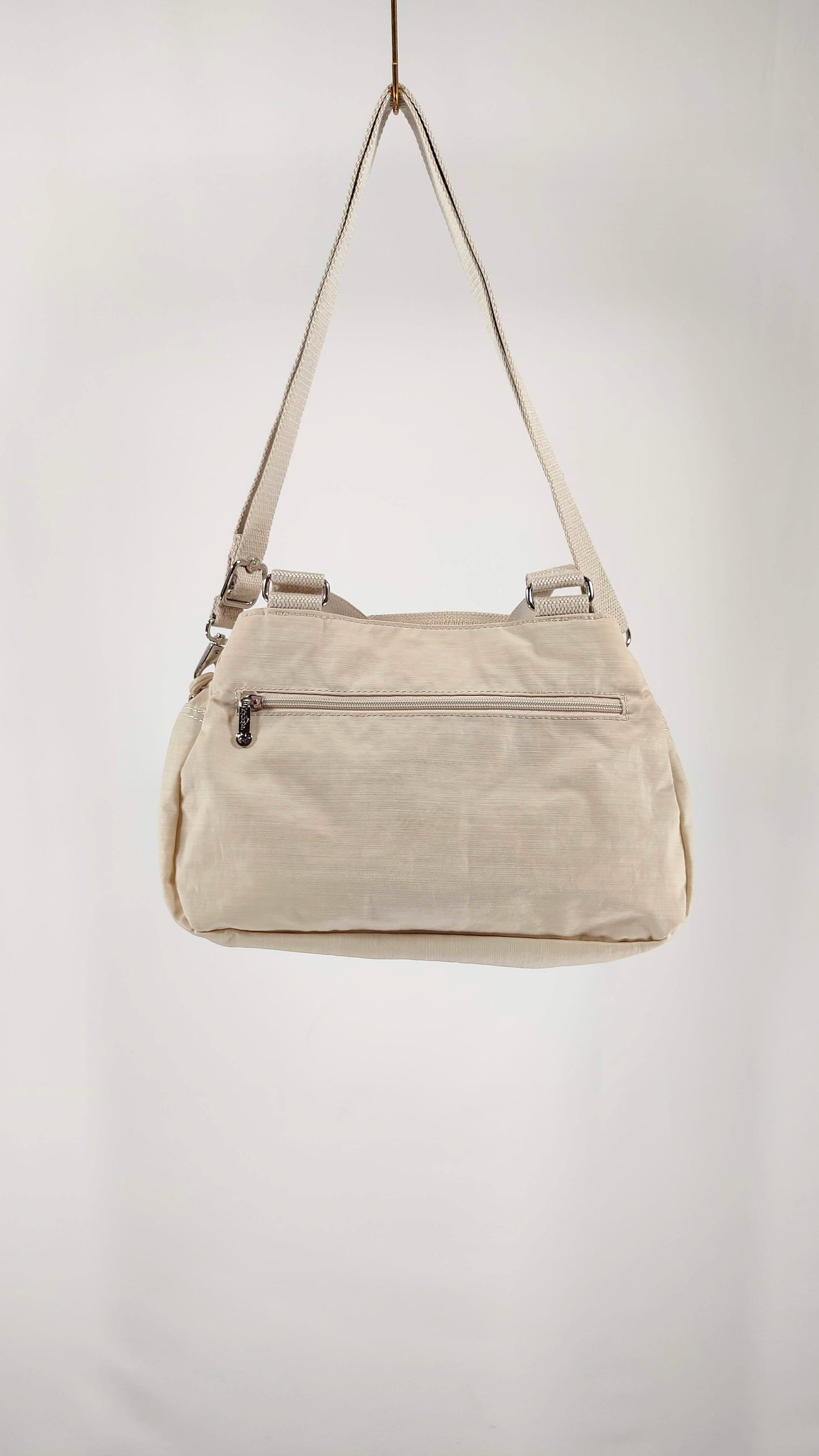 Bolsito blanco Kipling