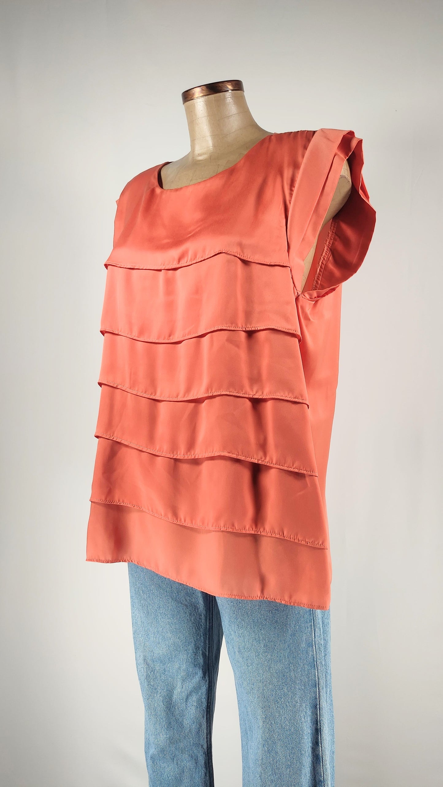 Blusa con volantes en naranja