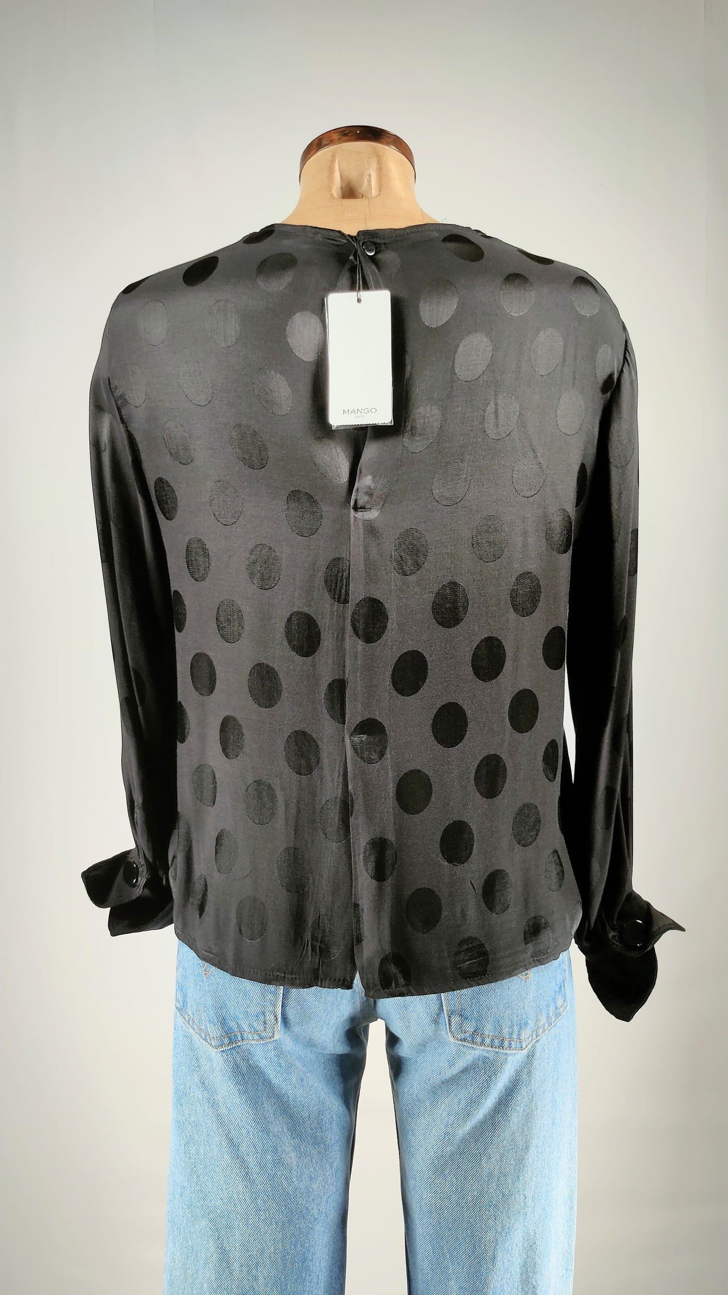 Blusa a topos
