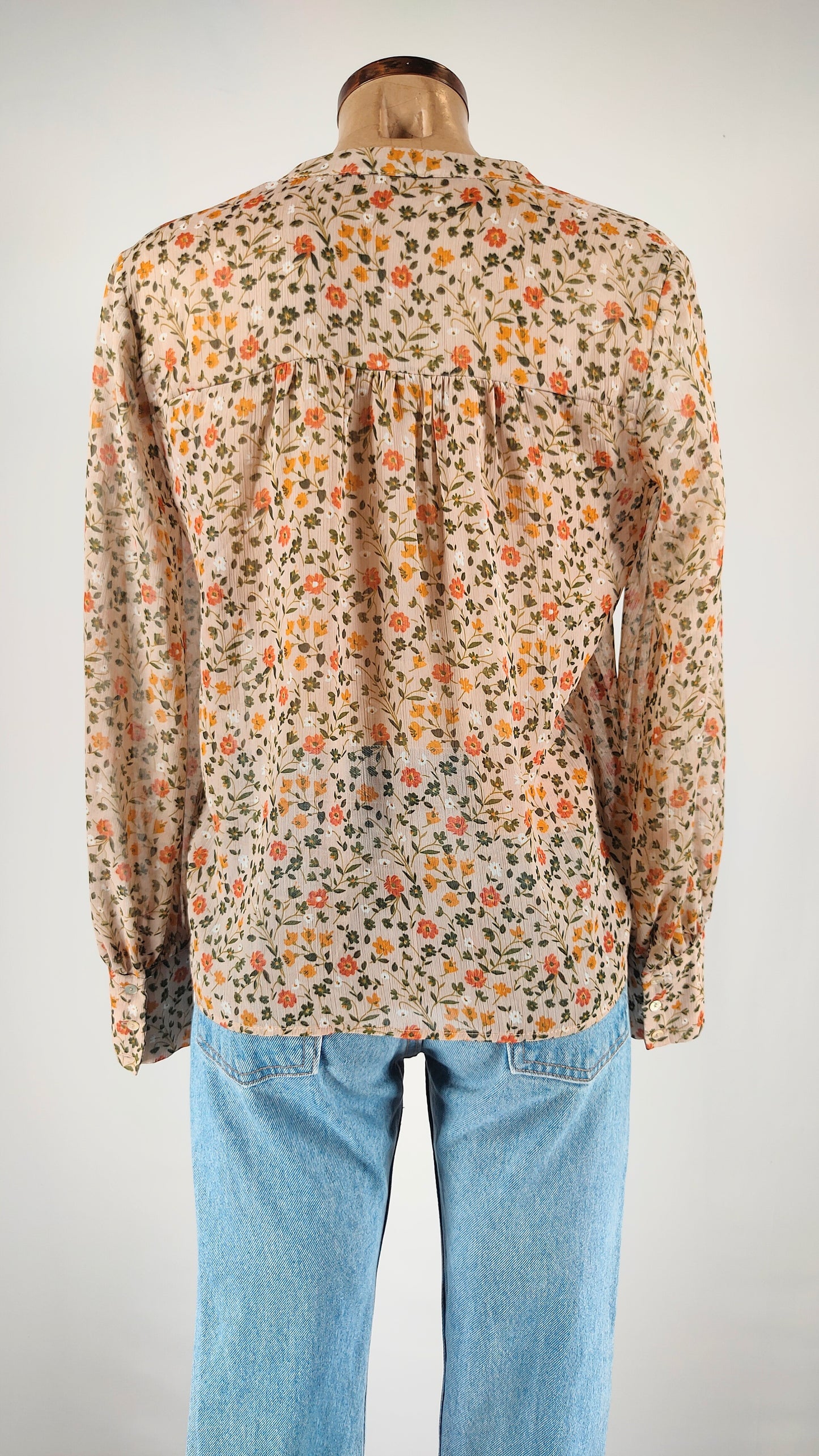 Blusa semi transparente de flores