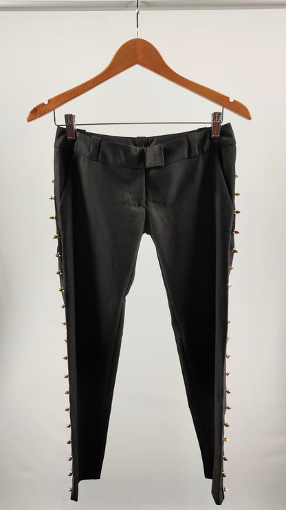 Pantalones con apliques dorados en lateral