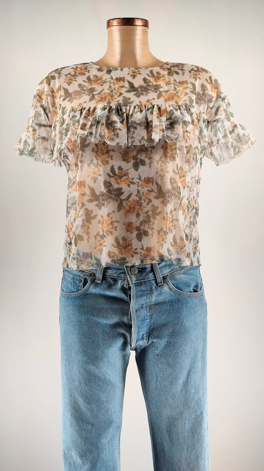 Camiseta semitransparente con flores