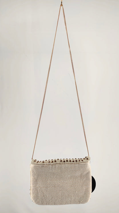 Bolso con apliques brillantes