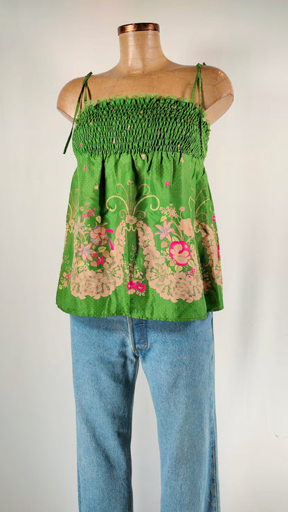 Top de seda verde System action