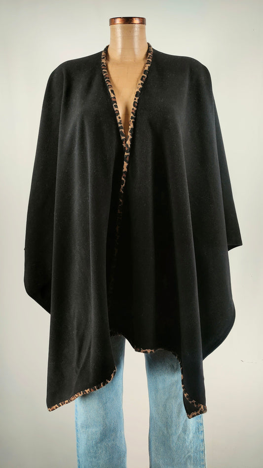 Poncho con ribete animal print Anna Mora