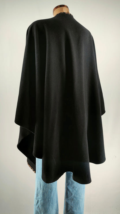 Poncho con ribete animal print Anna Mora