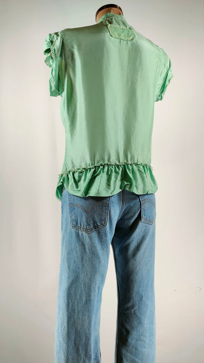 Blusa verde de seda con lazo en cuello