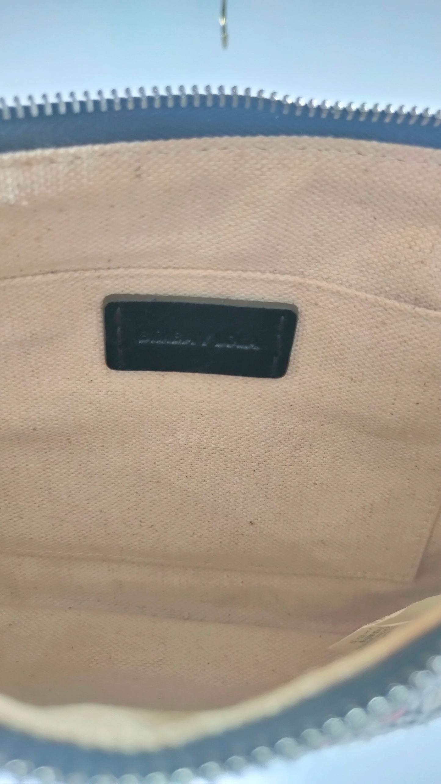 Bolso de mano con tira de piel