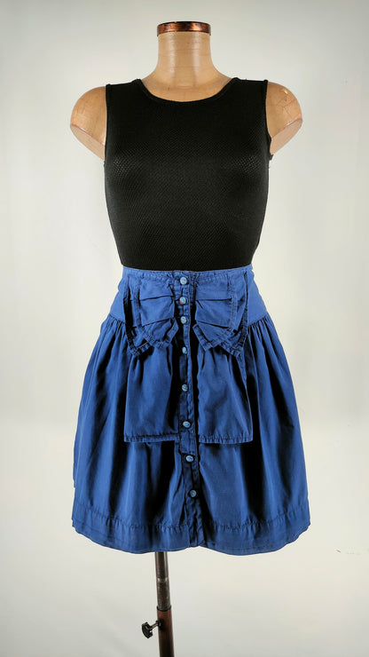 Falda con efecto de lazo frontal