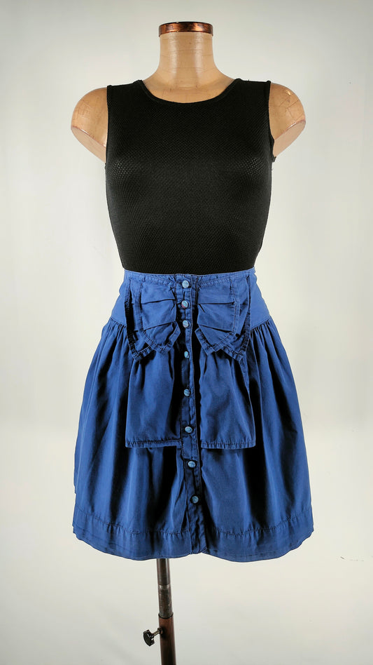 Falda con efecto de lazo frontal