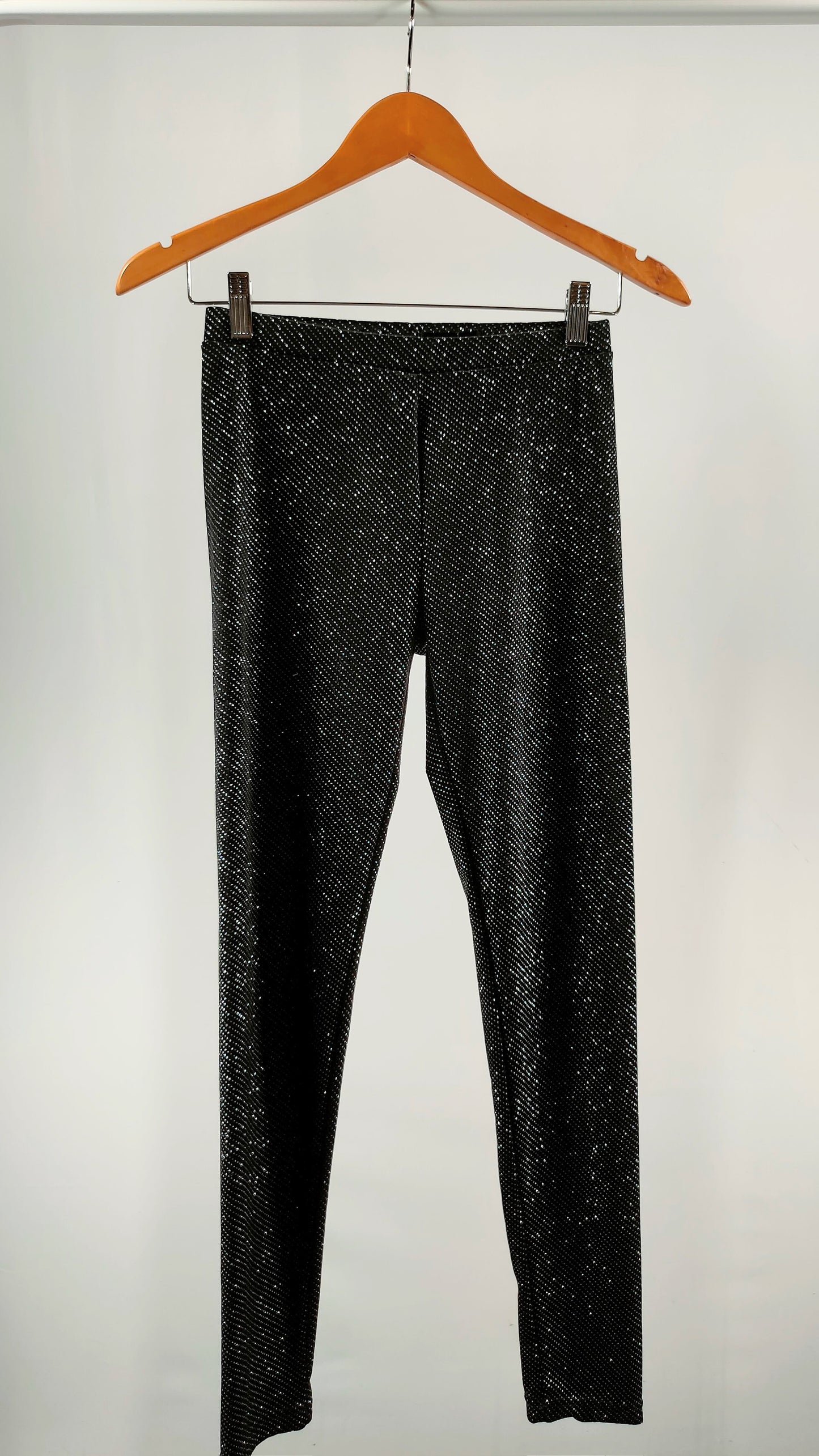 Pantalones ajustados con apliques brillantes