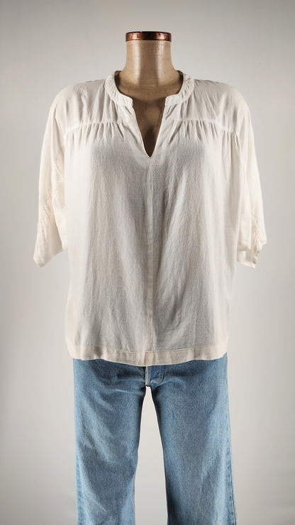 Blusa tres cuartos con cuello de pico