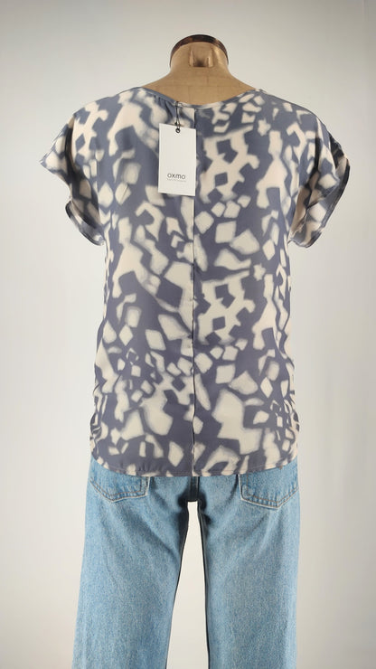 Blusa con estampado bicolor