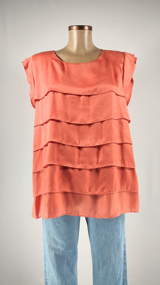 Blusa con volantes en naranja